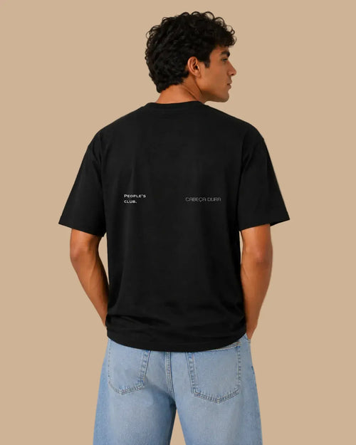 Back view of the Always Late Still Ahead black oversized Cabeça Dura T-shirt