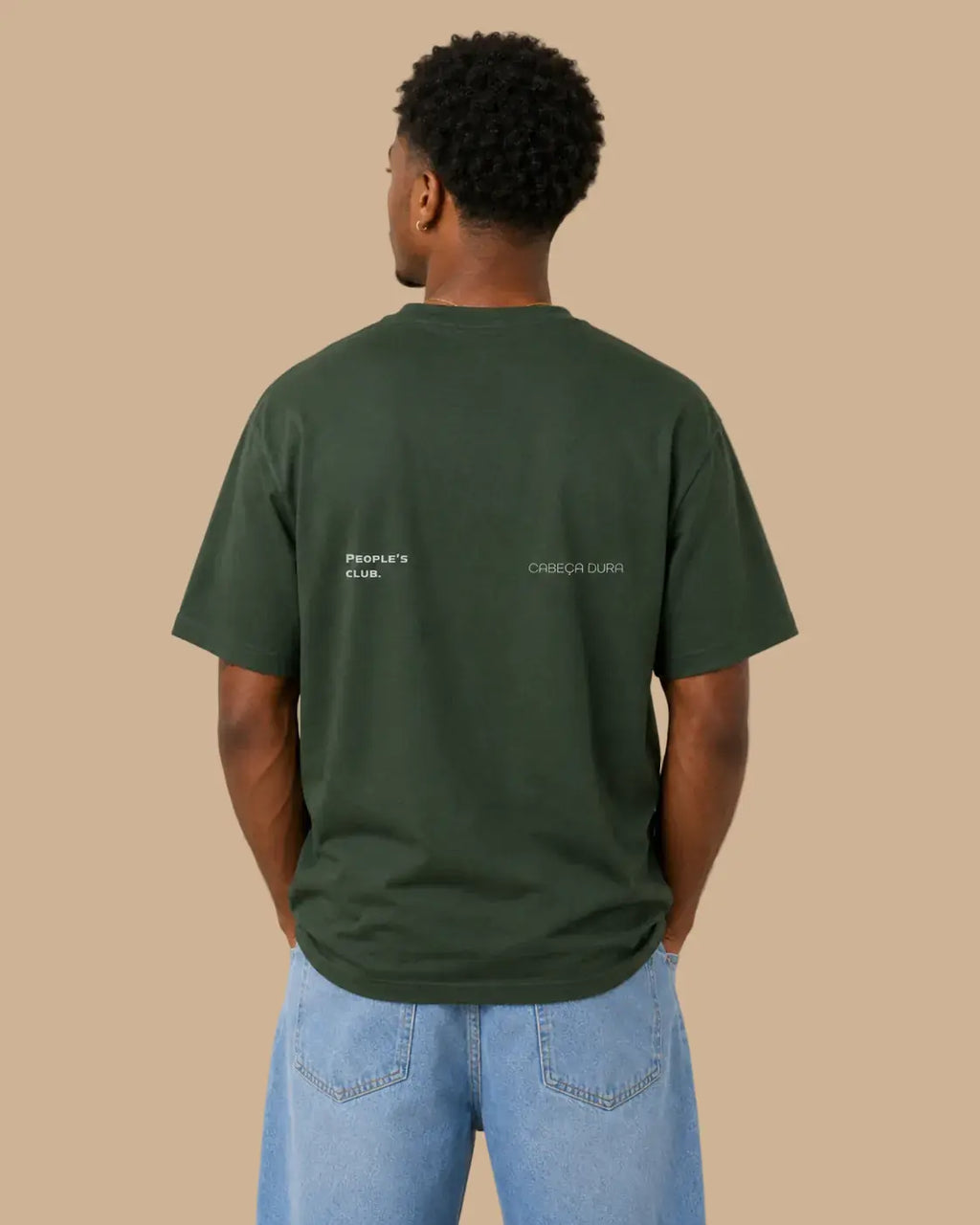 Back view of the Always Late Still Ahead forest green oversized Cabeça Dura T-shirt