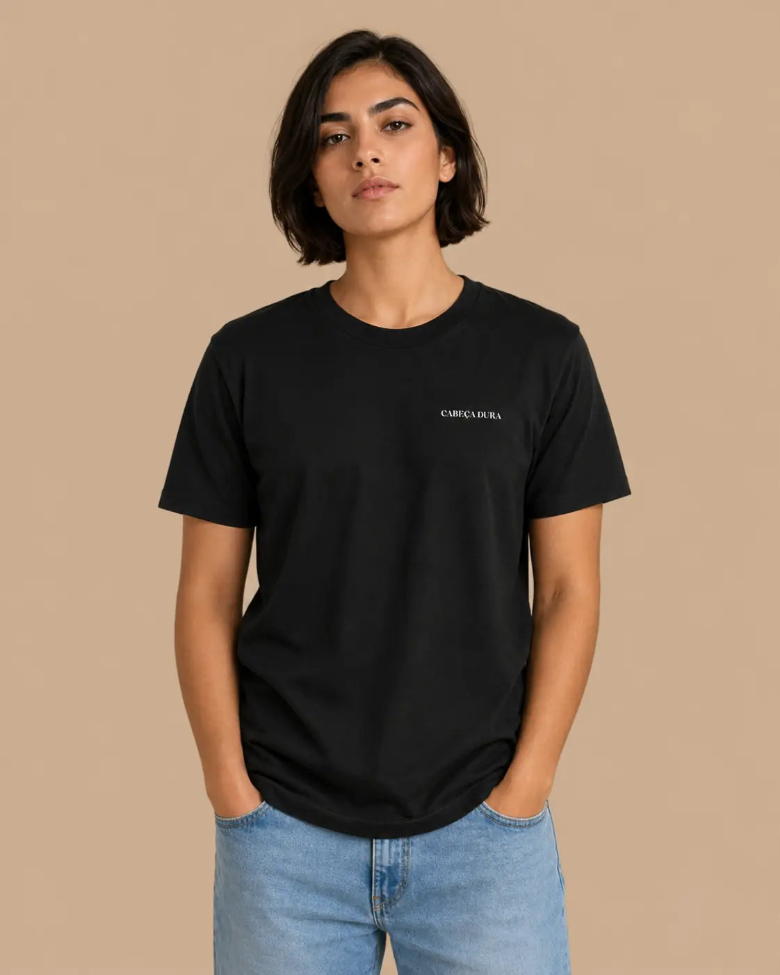 Female model wearing the Stay Solid black oversized T-shirt, front view